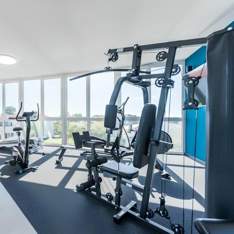 Squeeze in a morning workout in the resort's communal gym