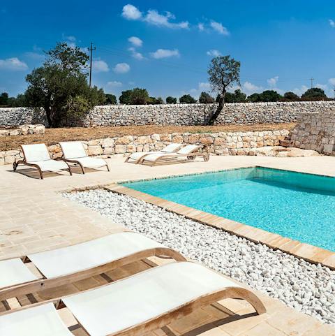 Sprawl out on the sun loungers soaking up the Sicilian rays