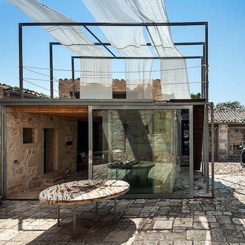 Slide open the huge glass doors and invite the breeze in
