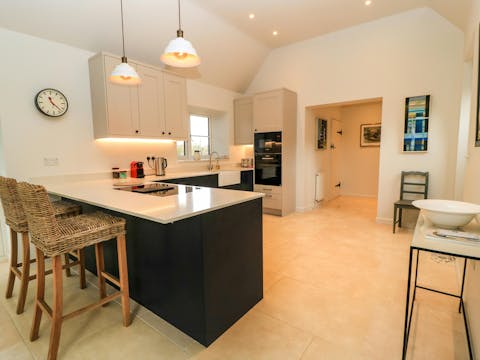 Cook together as a family in the fully equipped kitchen