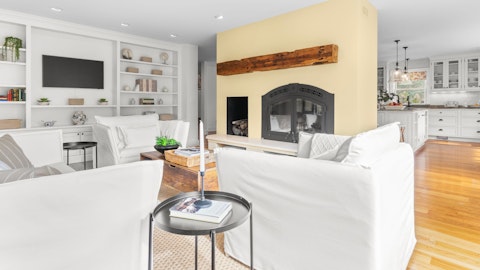 Curl up in front of the wood-burning fireplace on colder days