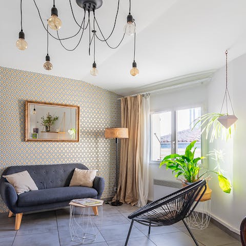 Relax on the comfy blue sofa after exploring Montpellier