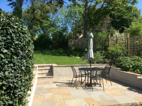 Wine and dine in the private garden during sunny summer months