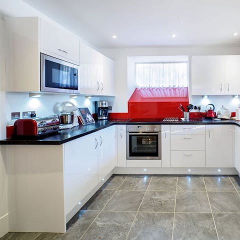 Play some tunes on the radio as you cook up a storm in the modern kitchen