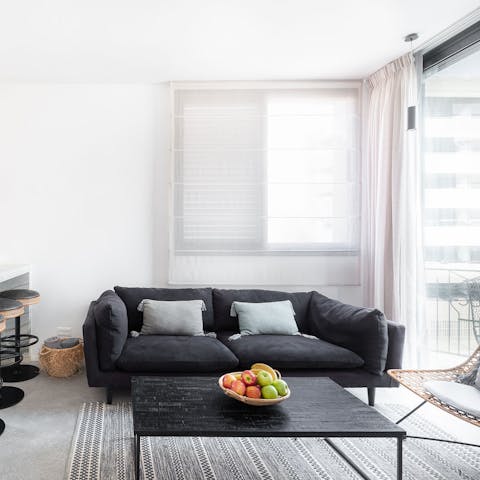 Unwind in the living area after a day of discovering Tel Aviv