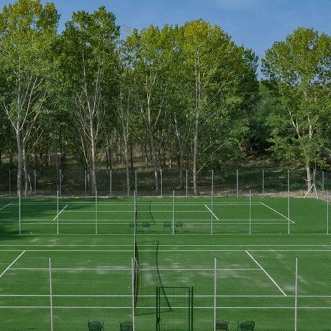 Practise your swing at the on-site tennis courts
