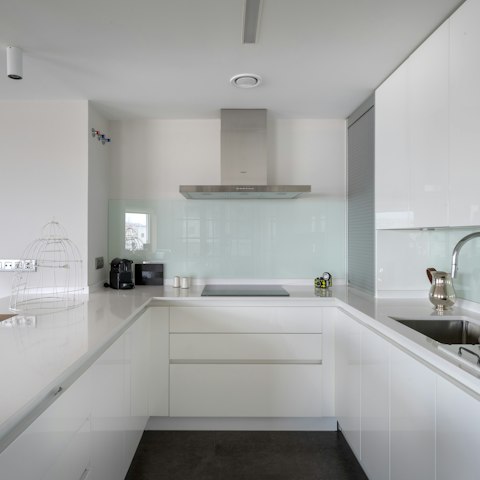 Plate up your own take of Spanish favourites in the sleek kitchen