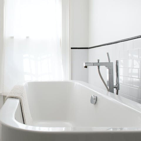 Soak in the deep bathtub