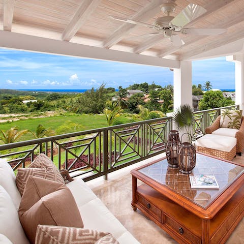 Watch the Bajan sunset from the shady privacy of the covered balcony
