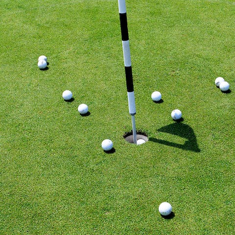 Play a round — or four — of golf on the resort's pristine course