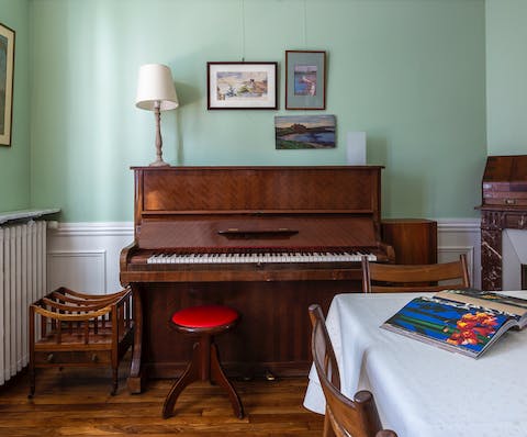 Gather around the grand piano for a sing-along