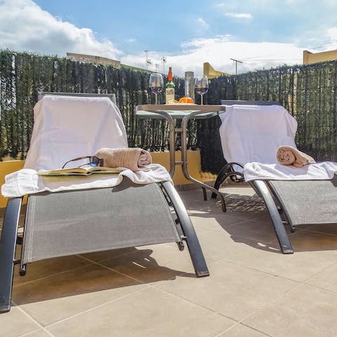 Soak up some rays on the roof terrace deck chairs