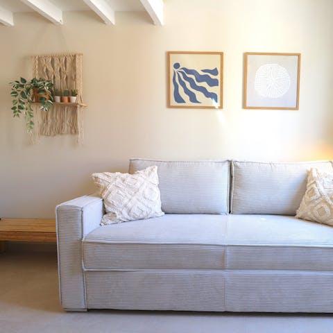 Stretch out on the sofa and rest weary feet