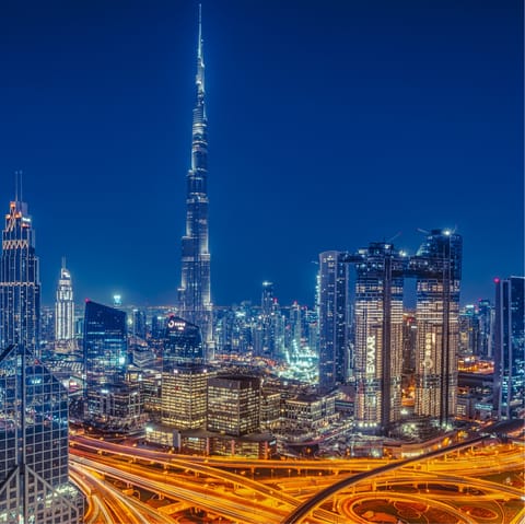 Chase the bright lights of Dubai's downtown, just a short drive away