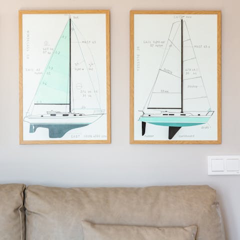 Check out the home's sailing themed artworks
