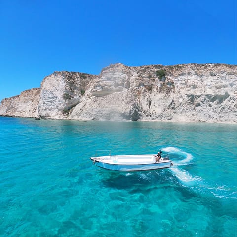 Explore the stunning Cretan coastline, with its turquoise sea and white cliffs