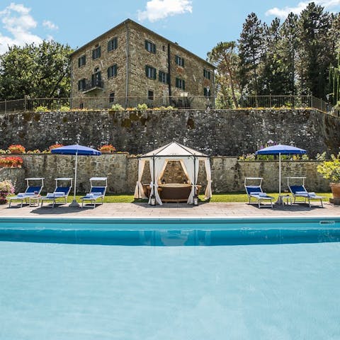 Spend blissful days drifting between the pool and a sun lounger
