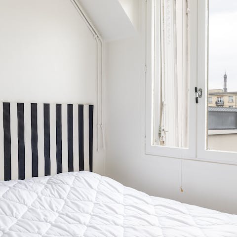 A light and bright bedroom with views