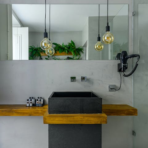 Primp for a night out in the sleek, minimalist bathroom