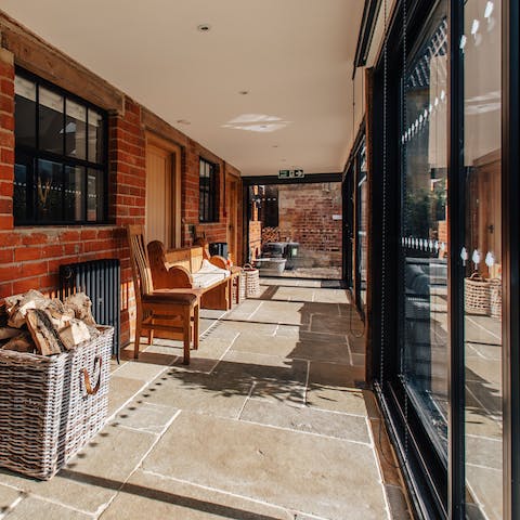Enjoy floor-to-ceiling views onto the garden from the glass walkway