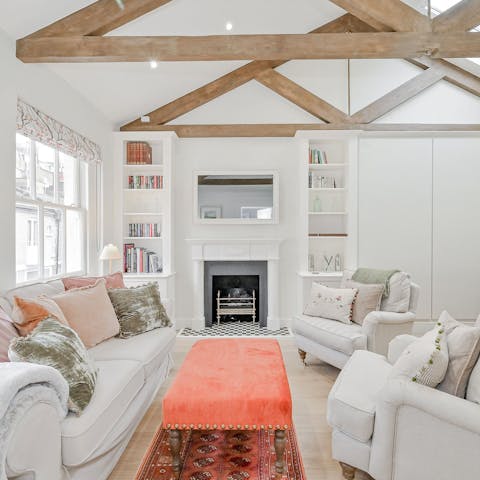 Get cosy with drinks and games in the living room