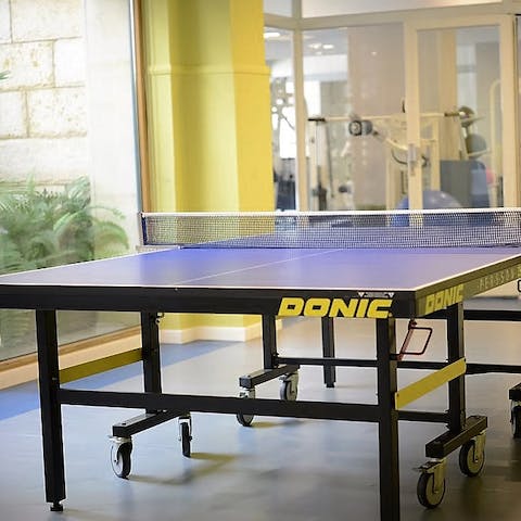 Take on a rival at table tennis