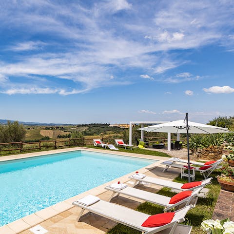 Swim and sunbathe out in the sunshine