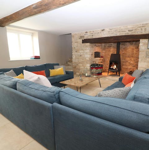 Spend cosy evenings curled up around one of four wood-burning stoves