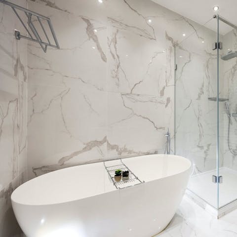 Run a hot bubble bath in the freestanding tub at the end of a busy day