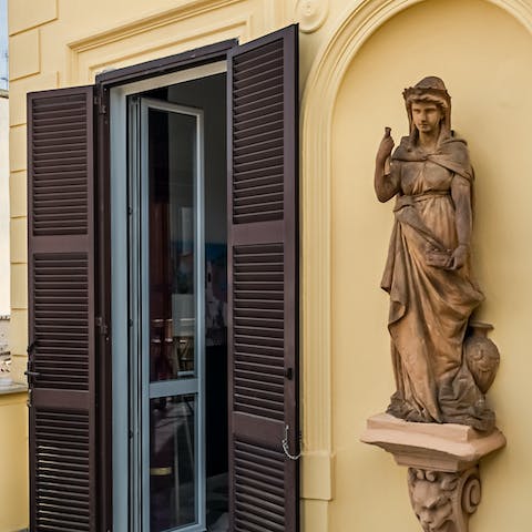 Admire the antique statue on the terrace