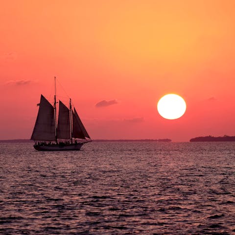 Celebrate the sunset at Mallory Square – a ten-minute bike ride away