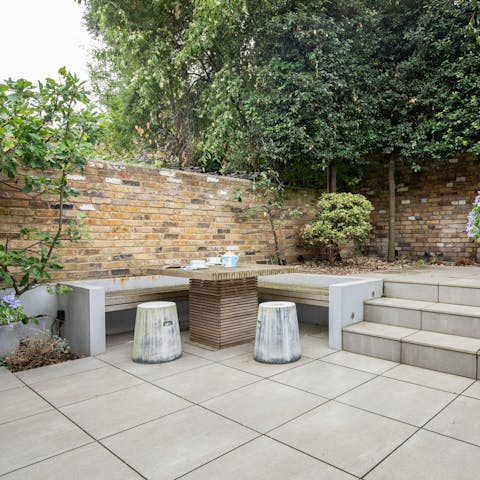 Sip your morning coffee in the quaint walled garden