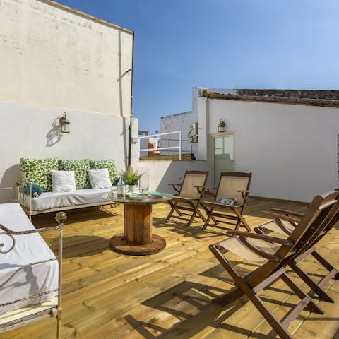 Enjoy sunny morning coffees or evening drinks on the private terrace