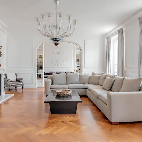 Relax in the grand living space with a glass of vintage Champagne