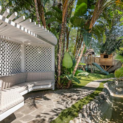 Fine yourself a quiet moment in the garden while the kids play on the jungle gym