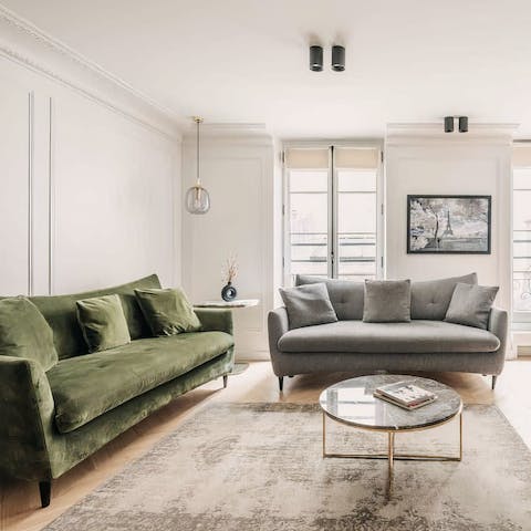 Unwind in the light-filled living room with a glass of French wine