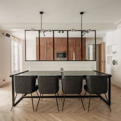 Sit down to a celebratory dinner at the chic dining table