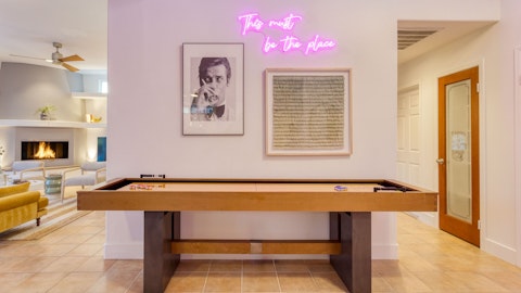 Challenge friends to a shuffleboard match