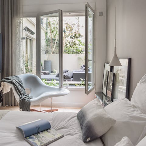 Wake up to peaceful views of the private terrace garden