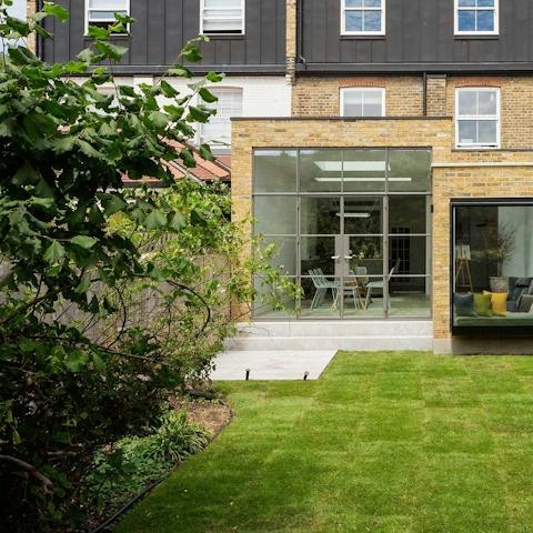 Sit out in the manicured garden with your morning coffee