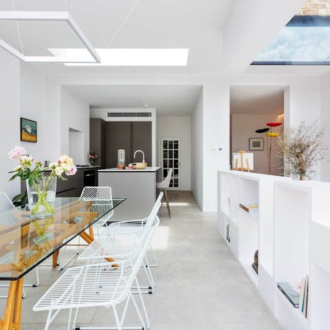 Enjoy preparing dinner, sipping cocktails and playing games in the sleek, sky-lit living space
