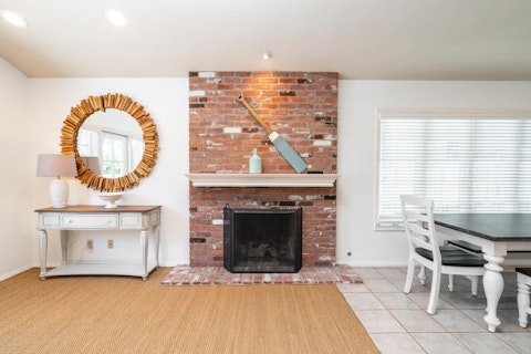 Gather around the fireplace on cooler California evenings