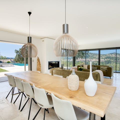Dine in style in the sunlight-drenched villa