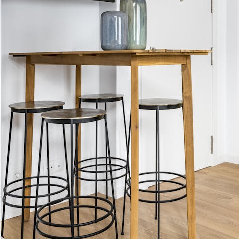 Sip your morning espresso at the chic dining table