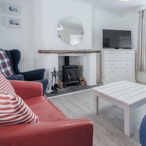 Warm up in front of the wood burner on a chilly evening