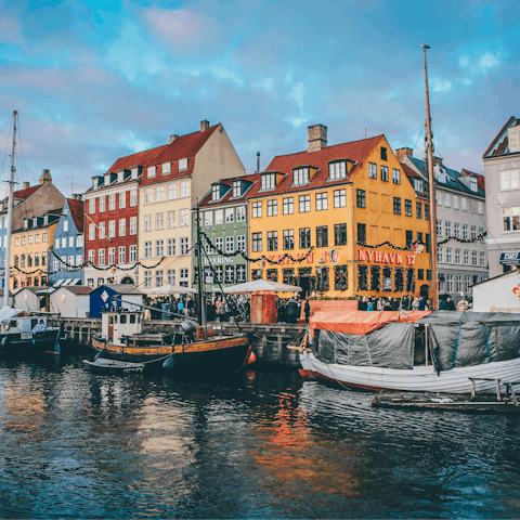 Stroll along the iconic harbour at Nyhavn, a five-minute walk away
