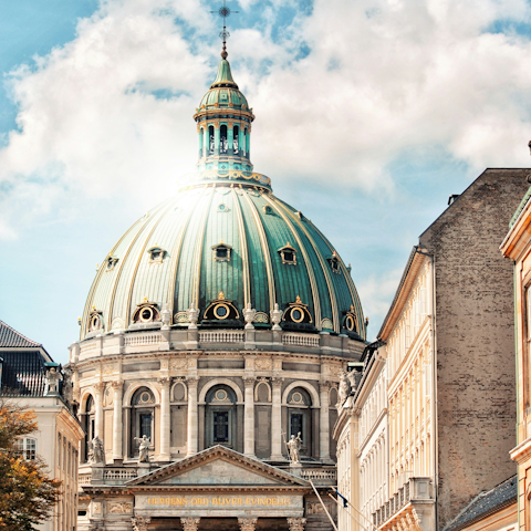 Marvel at the neoclassical architecture of Frederik's Church, seven-minute walk away