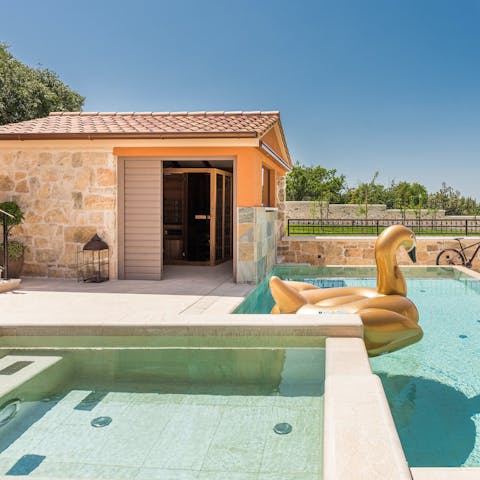 While away the day in the pool, Jacuzzi and saunas