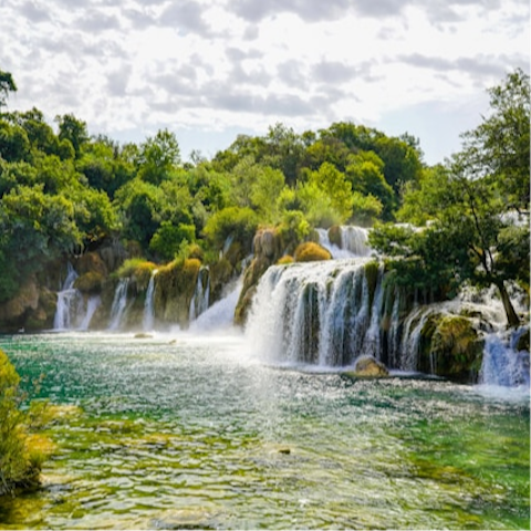 Head to the nearby waterfalls of Krka National Park
