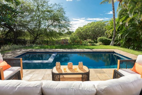 Enjoy a dip in the pool or lounge with an ice-cold beverage